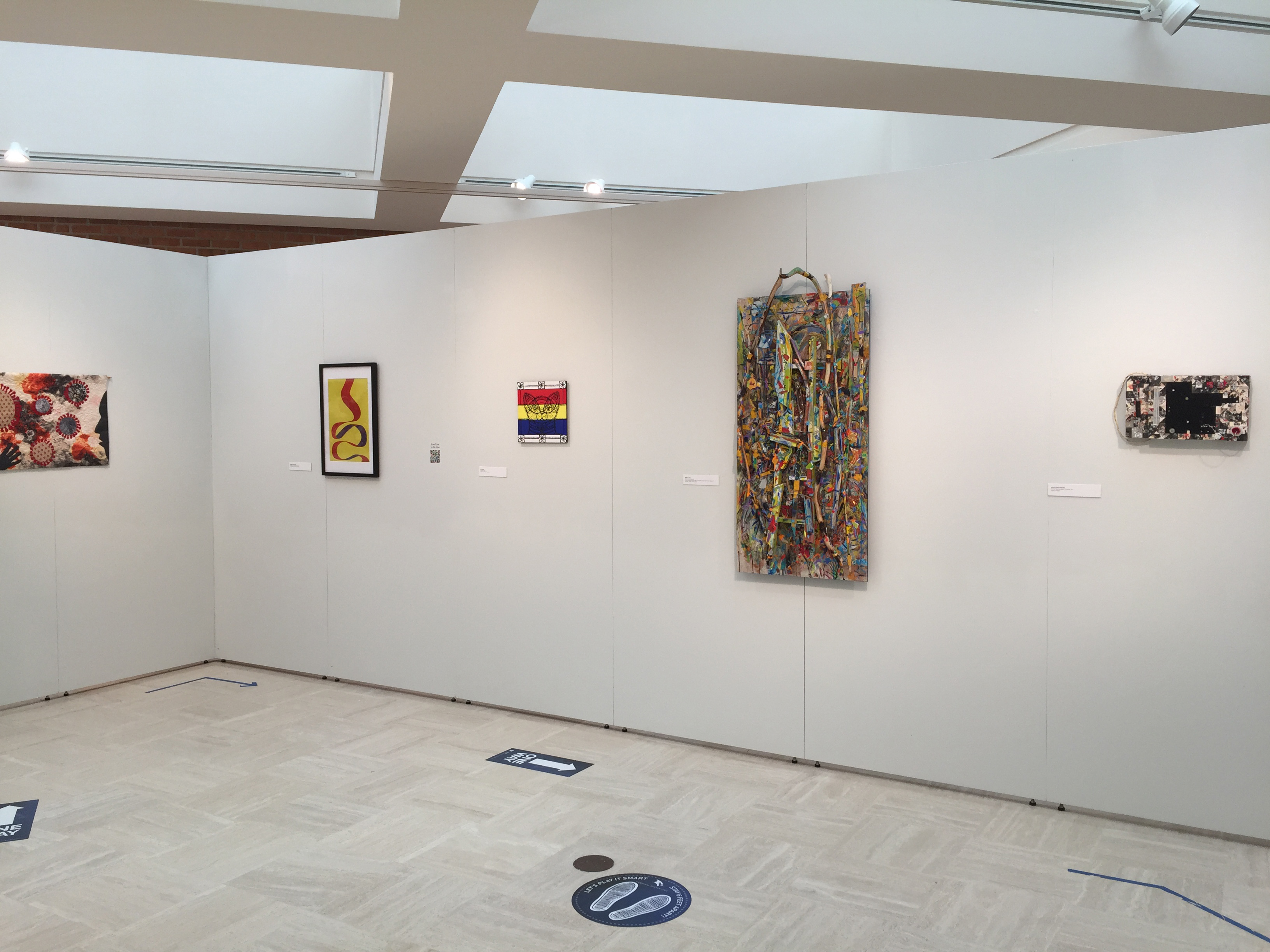 inside wall viewable from outside gallery